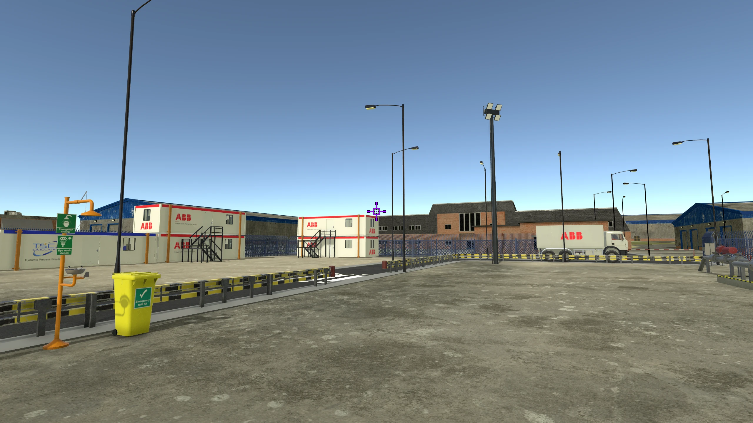 Virtual plant yard with ABB branded cabins and truck, TSC signage, emergency shower and process pipework.