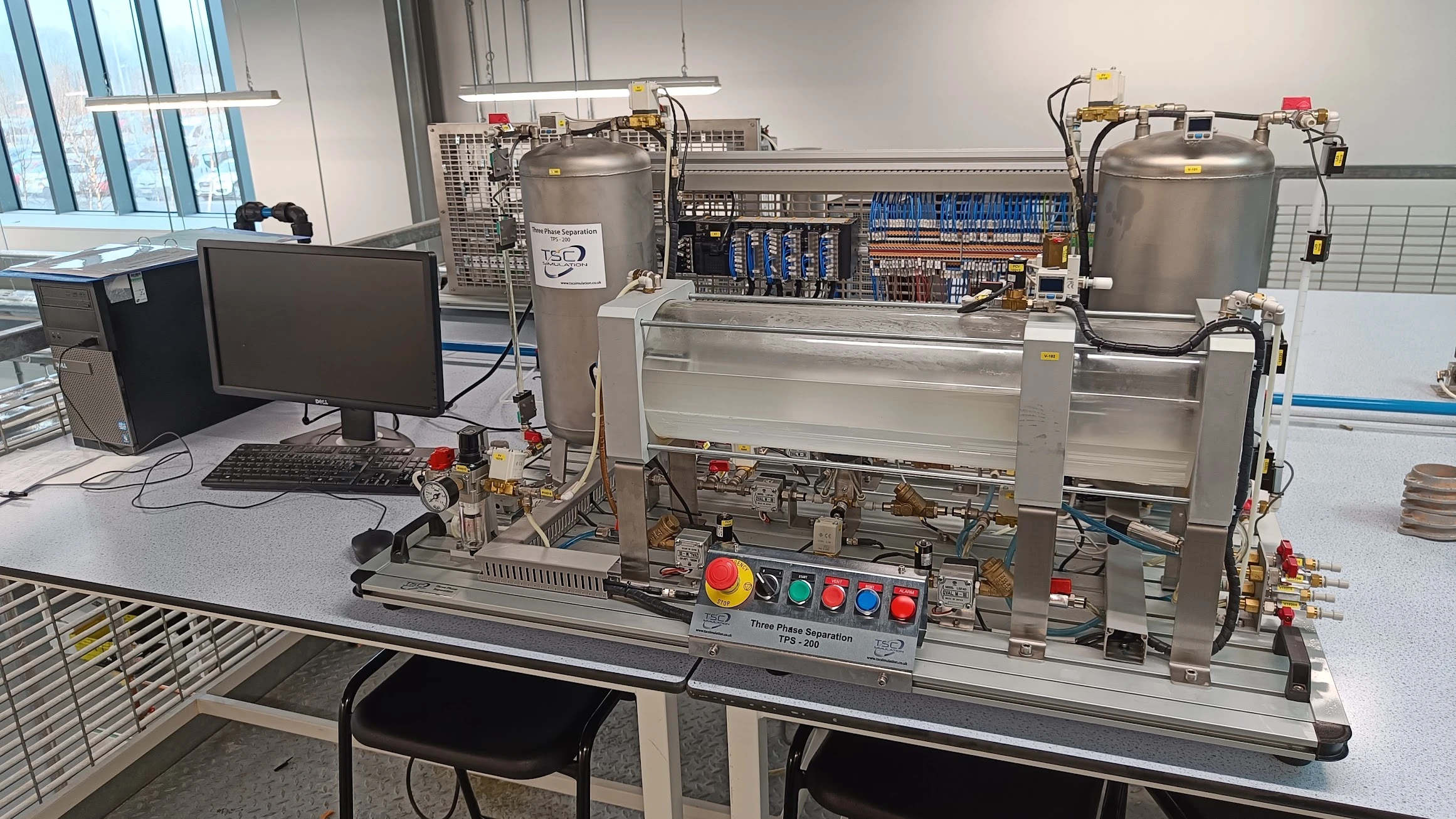 TPS200 three-phase separator at Forth Valley College, with two storage vessels, a transparent horizontal separator, instrumentation and its connected PC.